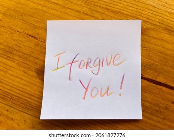 I Forgive You! Handwritten Text On Paper.