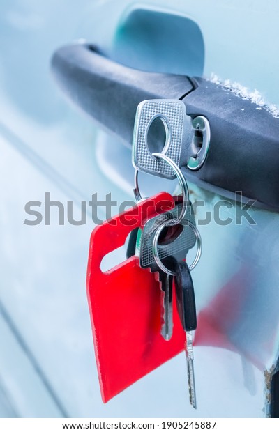 Forgotten keys inserted\
into car door lock