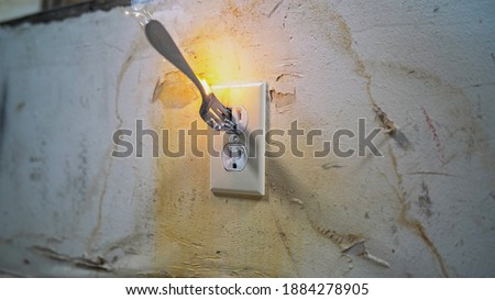 Fork Getting Zapped In Electrical Outlet