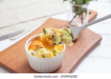 Fork Holding Bacon Broccoli Souffle