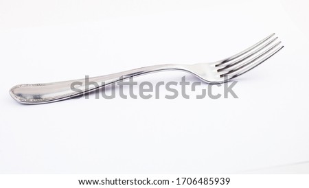 fork isolated on white background. metal fork. vintage fork cutlery side view.