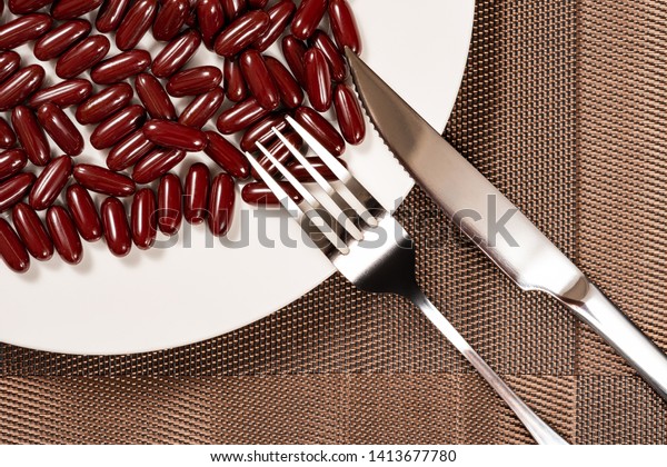 Fork Knife Lots Capsules On Dish Stock Photo Edit Now 1413677780