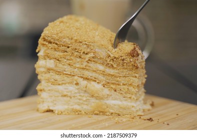 A Fork In A Layered Honey Cake. Food