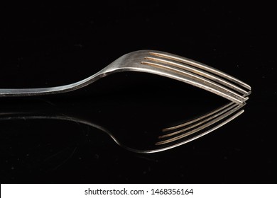 Fork On A Black Shinny Floor