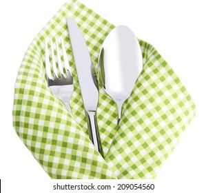 Fork Spoon And Knife In Napkin Isolated On White