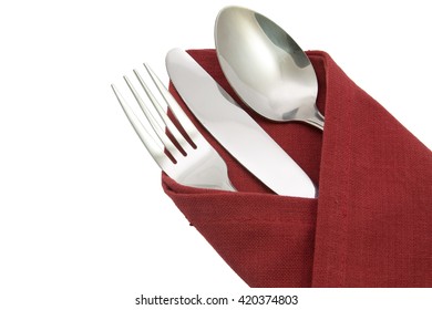 Fork Spoon And Knife On Red Napkin Isolated On White Background.