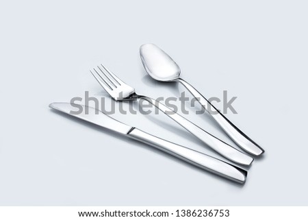 fork spoon and knife on white background