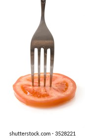 fork and tomato slice