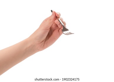 Fork In Woman Hand Isolated On White Background.