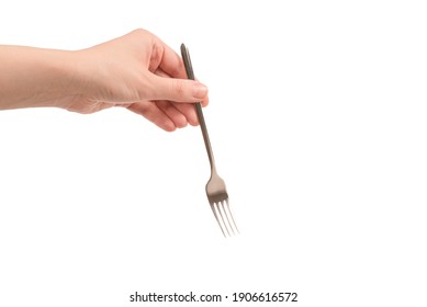 Fork In Woman Hand Isolated On White Background.