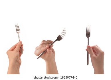 Fork In Woman Hand Isolated On White Background.