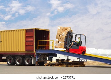 Forklift Driver Loading Truck