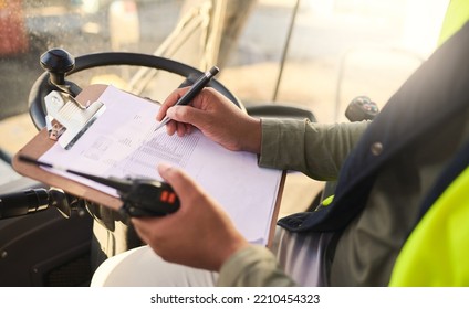 Forklift Driver And Writing On Checklist For Warehouse Admin And Organisation Of Stock Logistics. Professional Cargo Worker Report Schedule And Management Of Tasks Paperwork For Accountability.