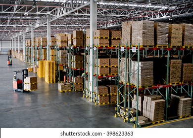 forklift in the large modern warehouse - Shutterstock ID 398623363