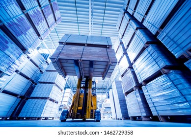 Forklift loader in storage warehouse ship yard. Distribution products. Delivery. Logistics. Transportation. Business background - Shutterstock ID 1462729358