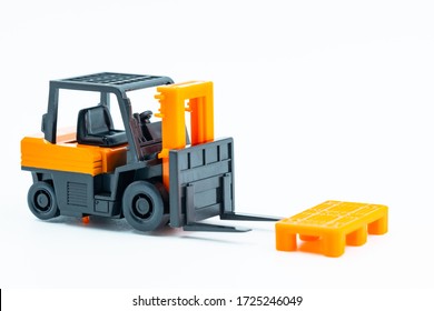 A Forklift And A Pallet