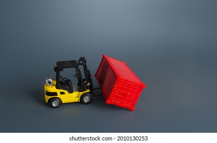 Forklift And Red Container. Effective Organization Of Goods Storage In A Warehouse. Warehousing Concept And Logistics Transportation Of Goods And Products. Import And Export. Delivery And Shipment