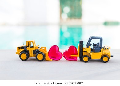 Forklift truck and front loader truck with red heart over blurred background, love industry, outdoor day light, valentine background idea - Powered by Shutterstock