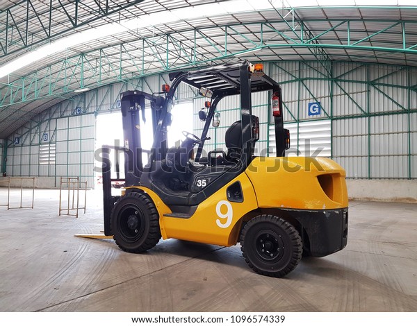 The forklift truck in ware
house