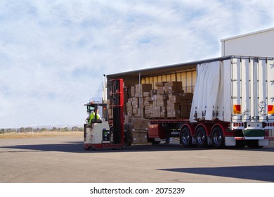 Forklift Unloading Truck