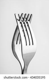 Forks On Grey Background.