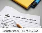 Form 1098-MA Mortgage Assistance Payments sign on the piece of paper.
