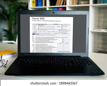  Form 945 Annual Return of Withheld Federal Income Tax   phrase on the page. - Shutterstock ID 1898463367