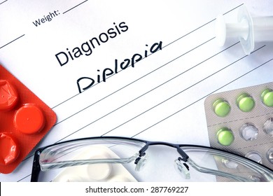 Form With Diagnosis Diplopia And Tablets. Medical Concept.