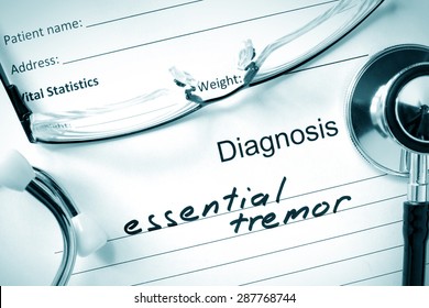 Form With Diagnosis Essential Tremor And Tablets. Medical Concept.