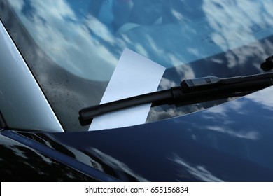 The form of a fine on the windshield of the car. - Shutterstock ID 655156834