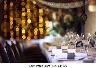 Formal Wedding Place Setting On Long Table Background Focus On Wine Glass