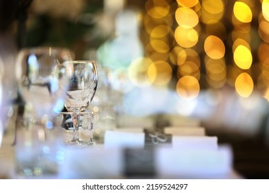 Formal Wedding Place Setting On Long Table Background Focus On Wine Glass