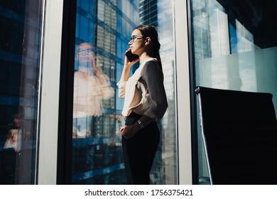 Formally Dressed Female Secretary Calling To Corporate Boss For Clarify Details During Working Day In Corporate Office,Caucasian Proud CEO Using Cellular App For Communicate With International Partner