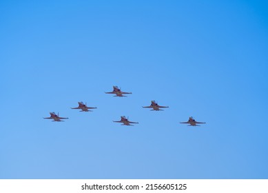 Formation flight of air display team Patrouille Suisse at Air Base Emmen of Swiss Air Force on a sunny spring day. Photo taken March 23rd, 2022, Emmen, Switzerland.