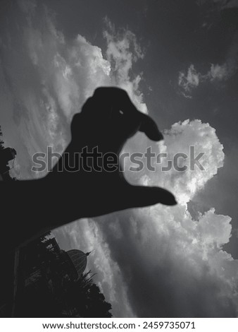 I formed a heart using clouds and my fingers, it turned out to be a very beautiful shape, the black heart symbolizes calm 🩶
