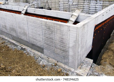 Formed and Poured Concrete Walls with Waterproofing                               