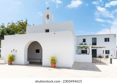 Formentera: church of El Pilar de La Mola. A typical white church with simple forms and Mediterranean character. Balearic Islands, Spain.