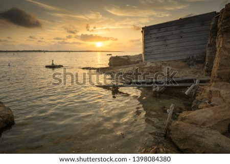 Similar – Abendroh; Segelyacht ankert in einer Bucht