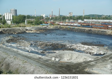 The Former Dump Toxic Waste In Ostrava, Oil Lagoon. Effects Nature From Contaminated Water And Soil With Chemicals And Oil, Environmental Disaster, Contamination Of The Environment