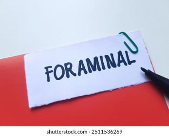 Forminal writting on table background.