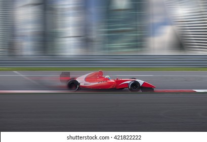  Formula 2.0 Race Car Racing At High Speed With Motion Blur On The Background Of The City In The Day
