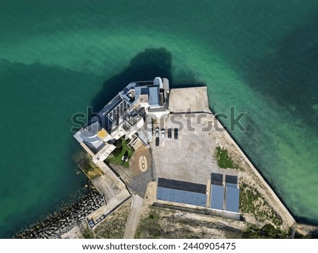 Fort Albert on Isle of White. Aerial top down view on the fort and green blue sea water. Calm summer day in Hampshire, UK.
