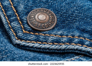 Fort Collins, CO, USA - November 7, 2022: Closeup Of A Metal, Pocket Button On Levi-Strauss Trucker Jacket. Levi Strauss And Co. Is American Clothing Company Known For Its Levis Brand Of Denim Jeans.