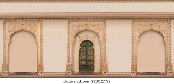 Fort, Colored Indian door with green wood and white stone, Wooden green door entrance in Mehrangarh (Meherangarh) Fort, Jodhpur, Rajasthan, India. Ornate brass door set in white marble frame,vintage.