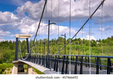 Fort Edmonton Park Footbridge And Clouds