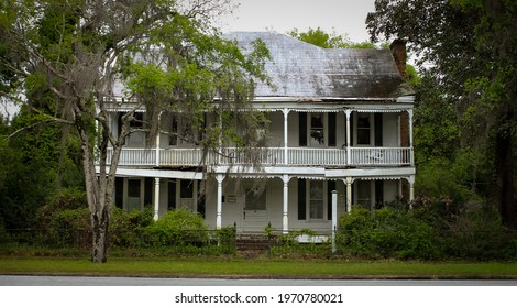 Fort Gaines, Georgia United States - April 8 2021: An Abandoned Two Story Home 