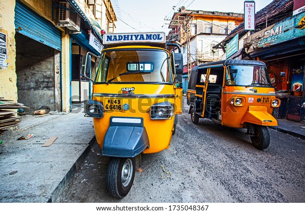 Fort Kochin, Kerala, India - January 19,\
2020: Traditional indian transportation - motor rikshaw on the\
streets of Fort Kochin, Kerala,\
India