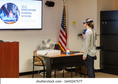 Fort Lauderdale, FL / USA - 2/10/2020: Broward County Directors And Employee Staff Wearing Magic Leap 1 Augmented Mixed Virtual Reality Headsets Learning About Spatial 3D Computing.