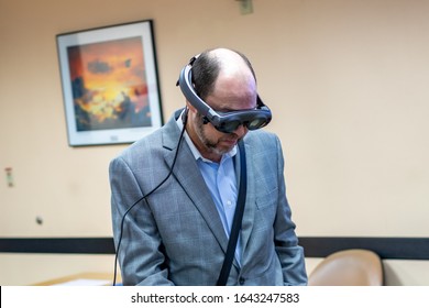 Fort Lauderdale, FL / USA - 2/10/2020: Broward County Directors And Employee Staff Wearing Magic Leap 1 Augmented Mixed Virtual Reality Headsets Learning About Spatial 3D Computing.