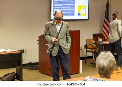 Fort Lauderdale, FL / USA - 2/10/2020: Broward County Directors And Employee Staff Wearing Magic Leap 1 Augmented Mixed Virtual Reality Headsets Learning About Spatial 3D Computing.